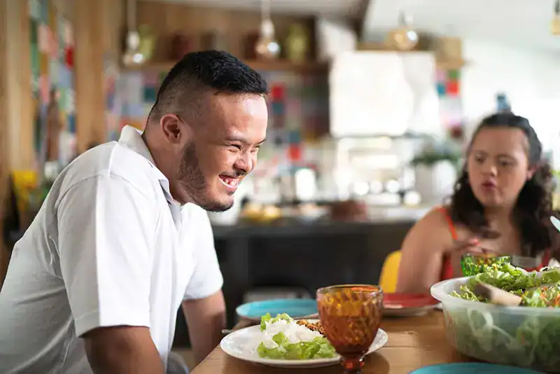 Empowering Weight Loss: A Comprehensive Guide for Individuals with Disabilities 2 Image of a disabled man and balance around nutrition to aid weight loss Busby