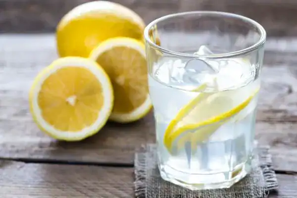Hydration: The Secret Ingredient for a Toned Stomach and Enhanced Fitness 2 Image of lemon water to aid hydration Busby