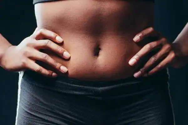 Toning Your Stomach: The Ultimate Guide to Achieving a Sculpted Stomach While Shedding Pounds 1 Image of a toned stomach after non surgical treatment Busby
